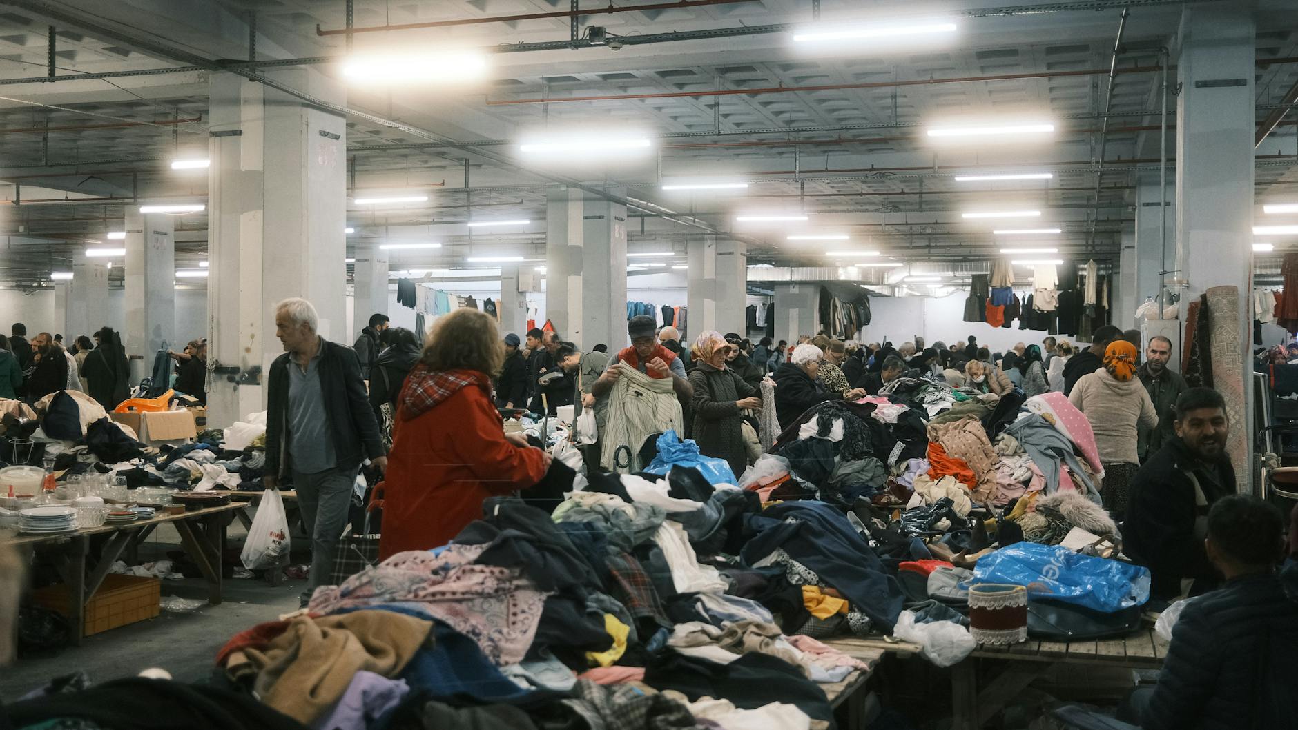 Crowded textile market in Jakarta with stalls selling fabrics