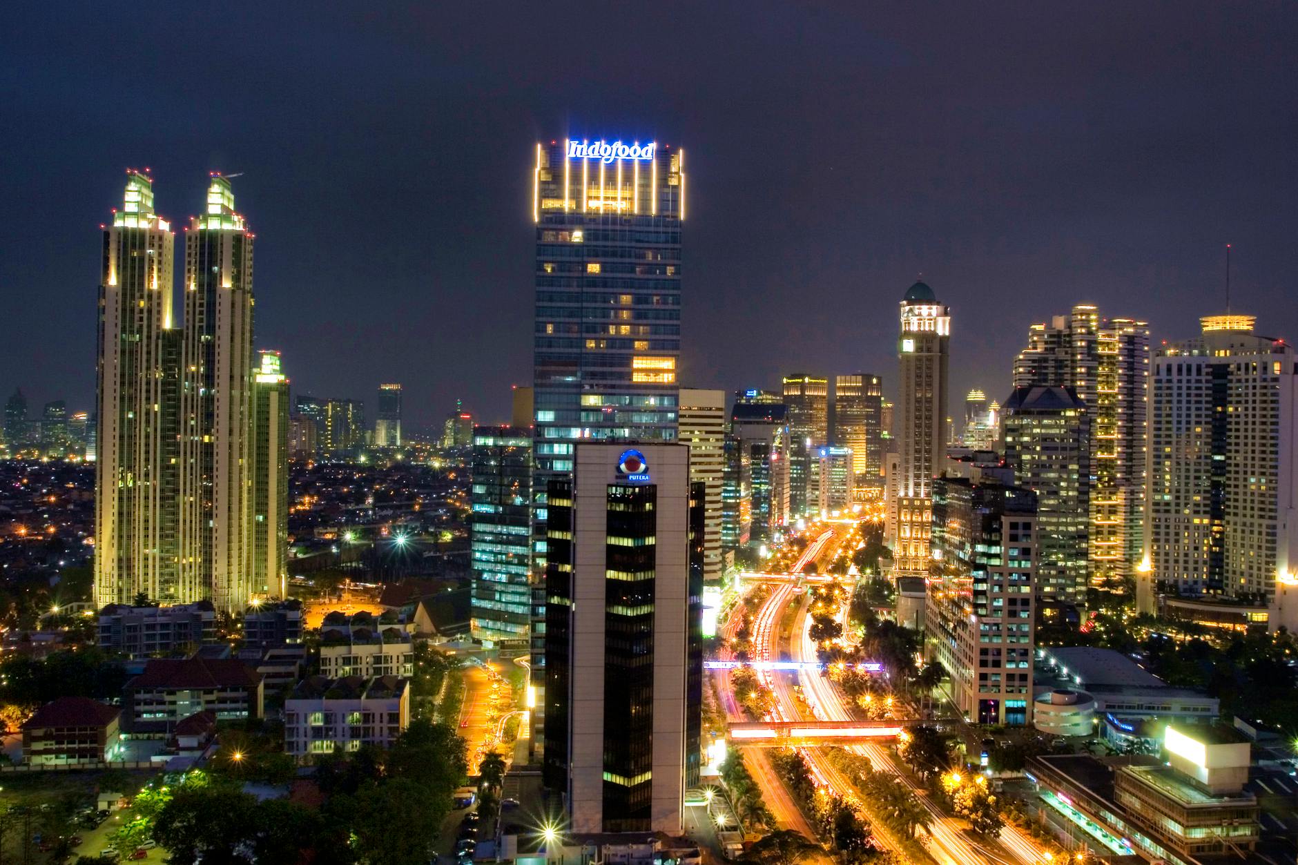 Aerial Jakarta street with streetlights and traffic