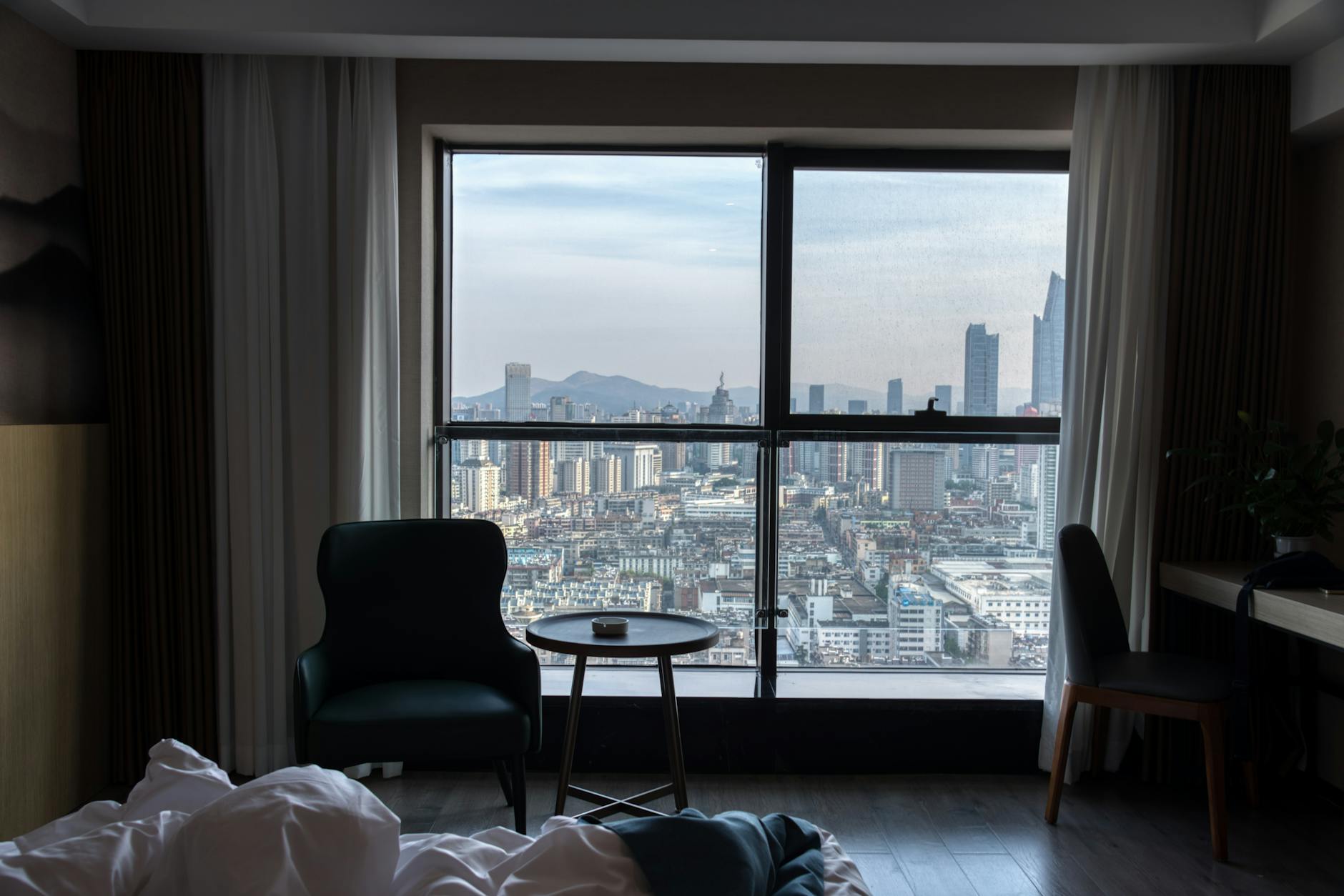 Modern 4-star hotel room with city view