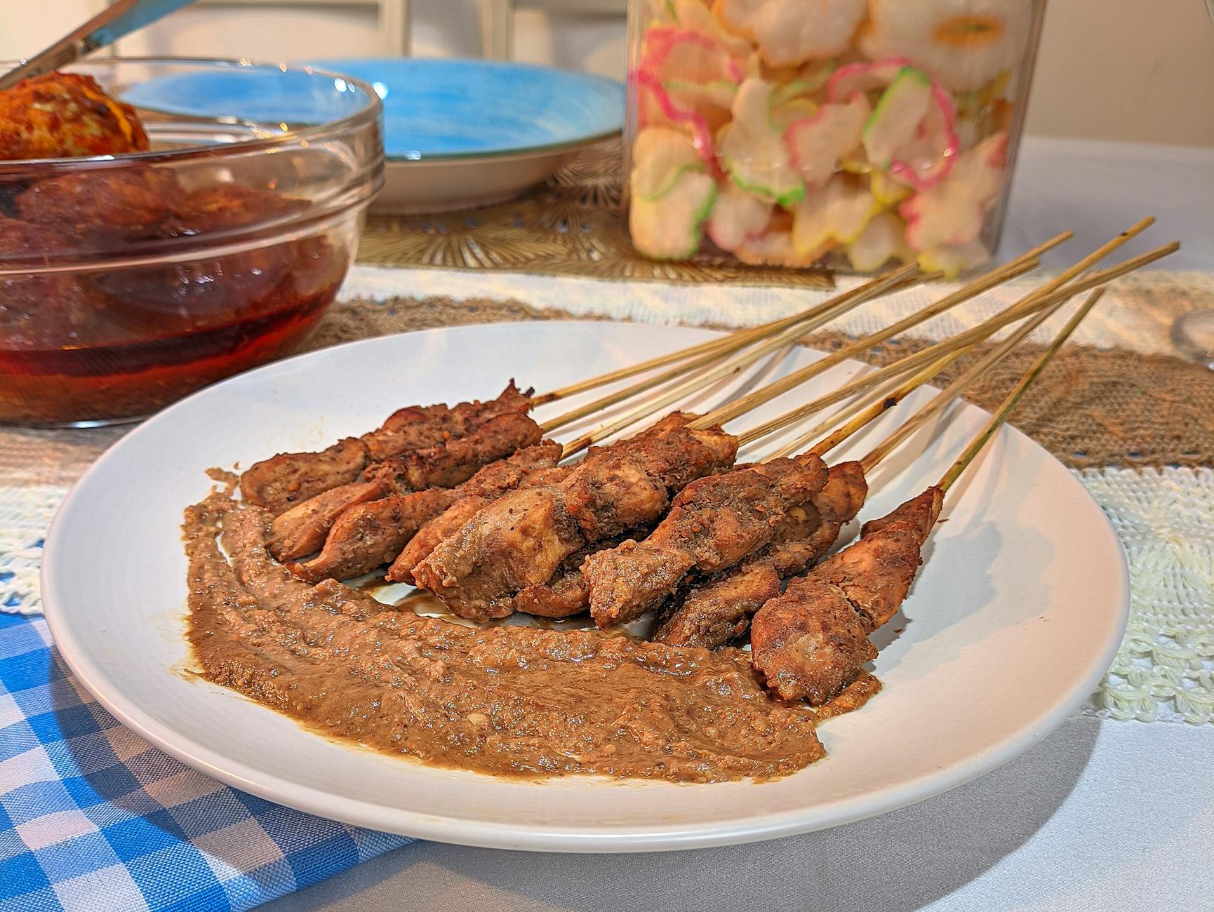 Indonesian chicken satay skewers with peanut sauce