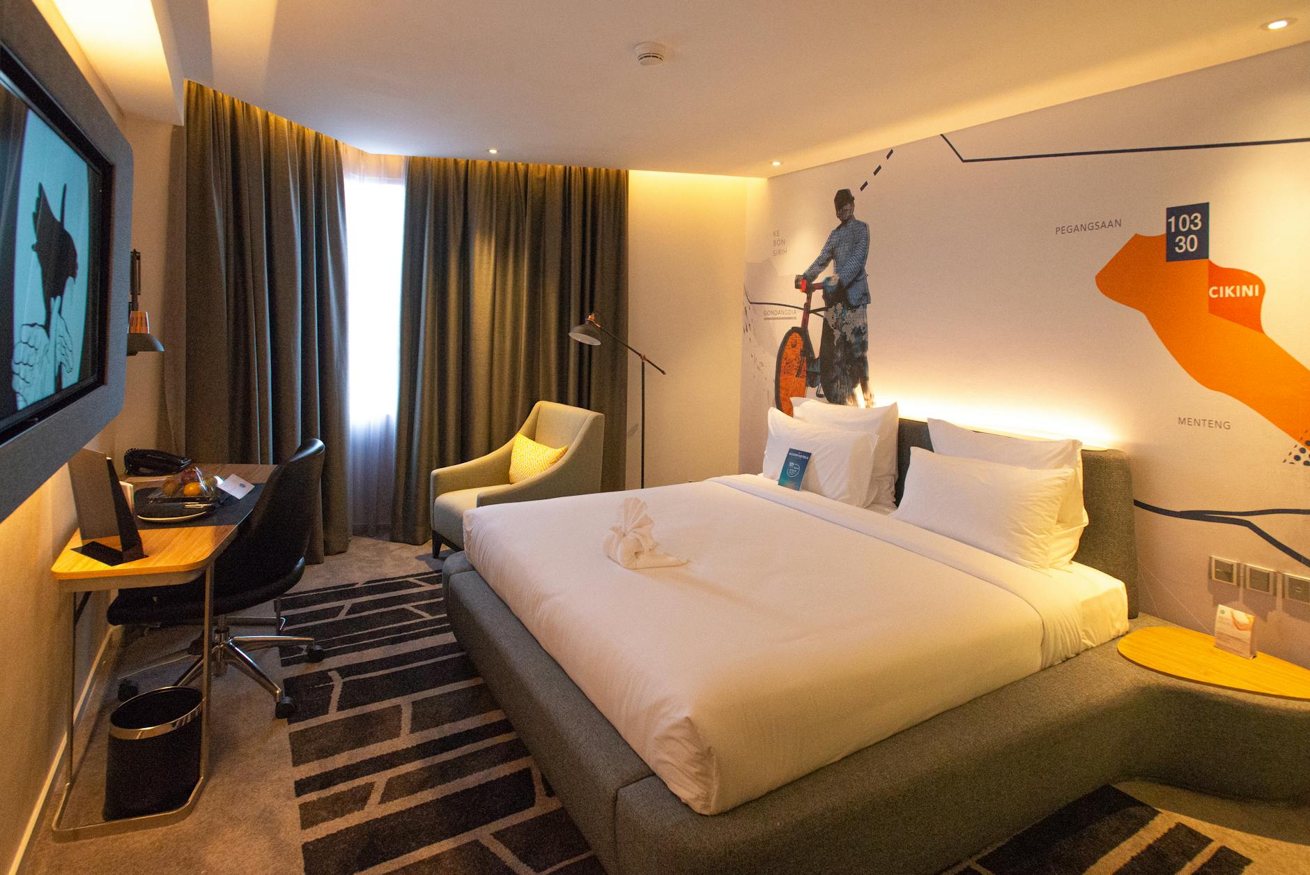 Beautifully decorated boutique hotel room showing where to stay in Jakarta accommodation options