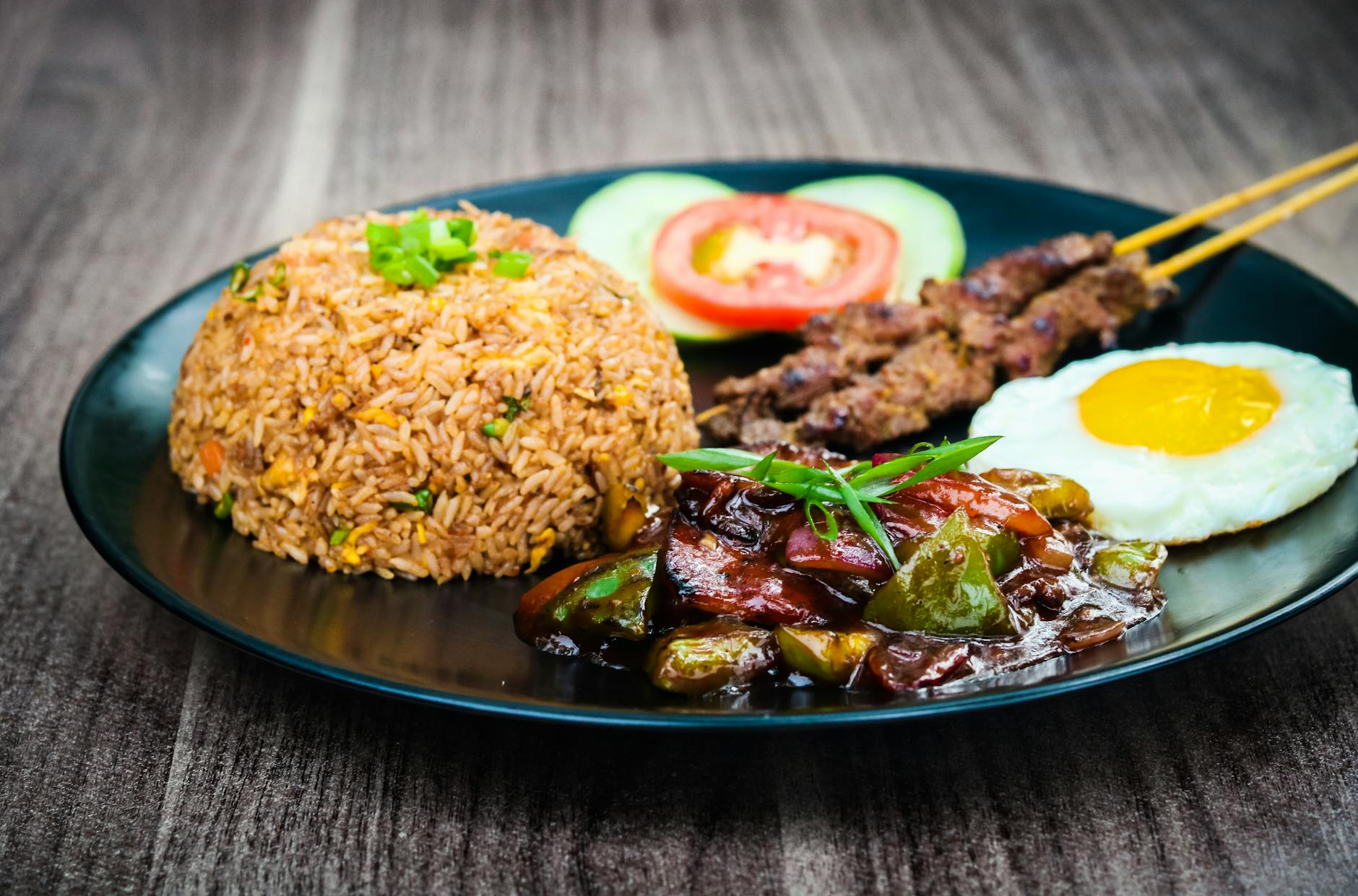 Delicious nasi goreng Indonesian fried rice served on a plate in Jakarta