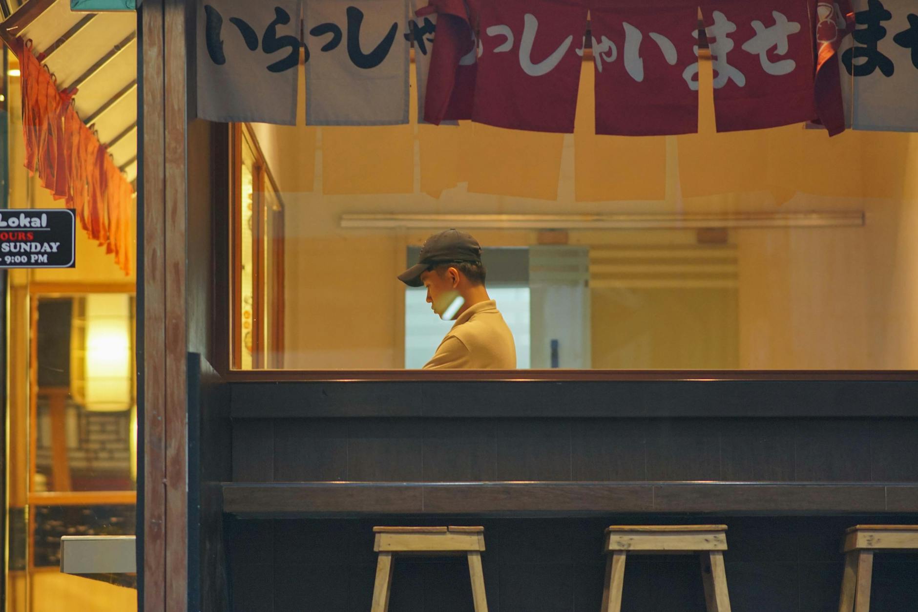 Modern restaurant interior with diners eating