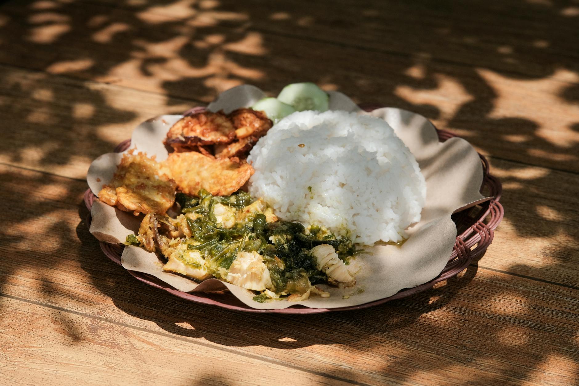 Indonesian nasi uduk spread with fried chicken sides
