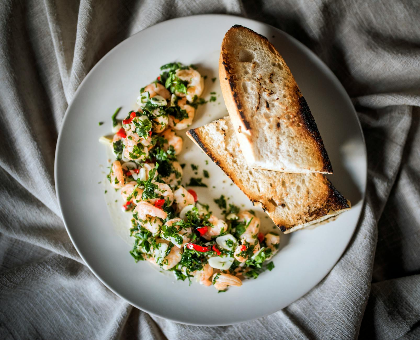 Indonesian butter garlic prawns shrimp on plate
