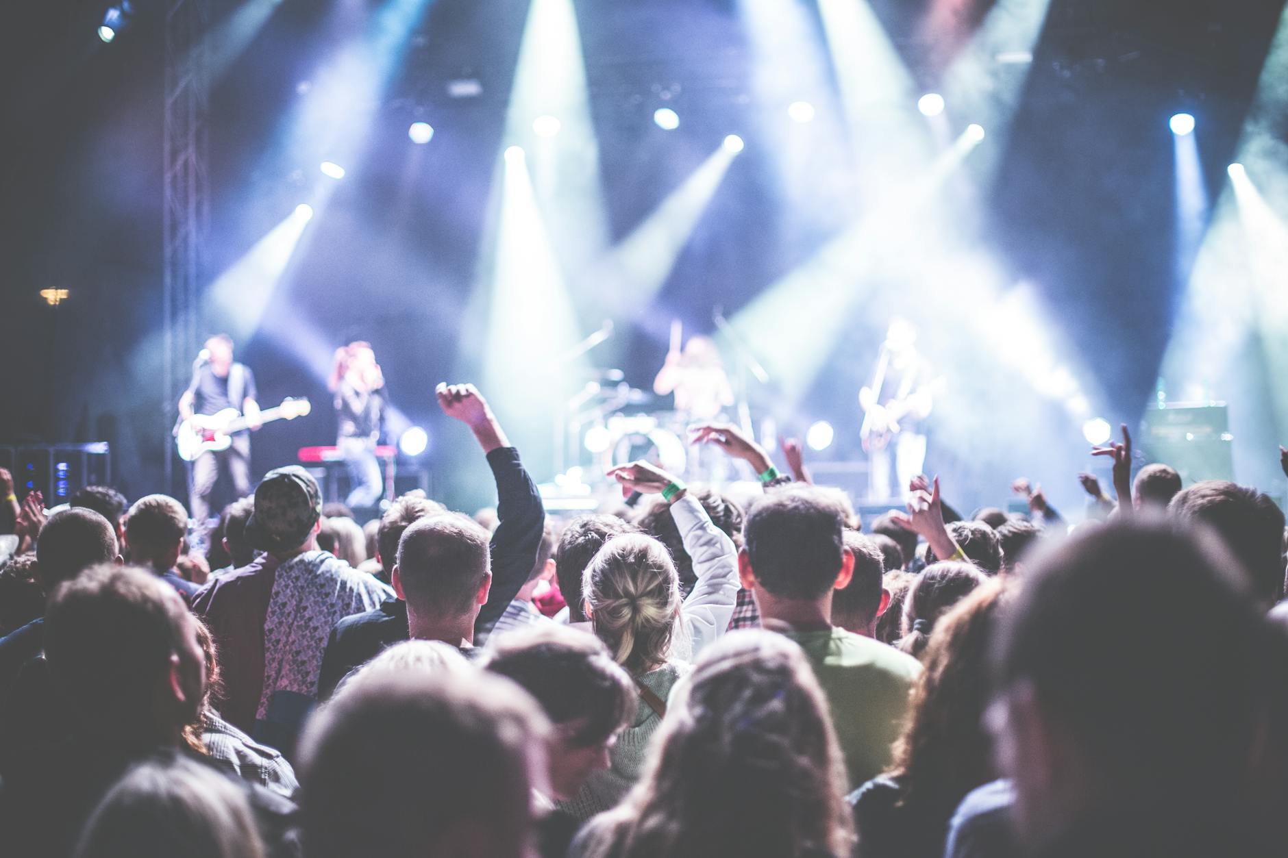 Concert audience watching live music venue