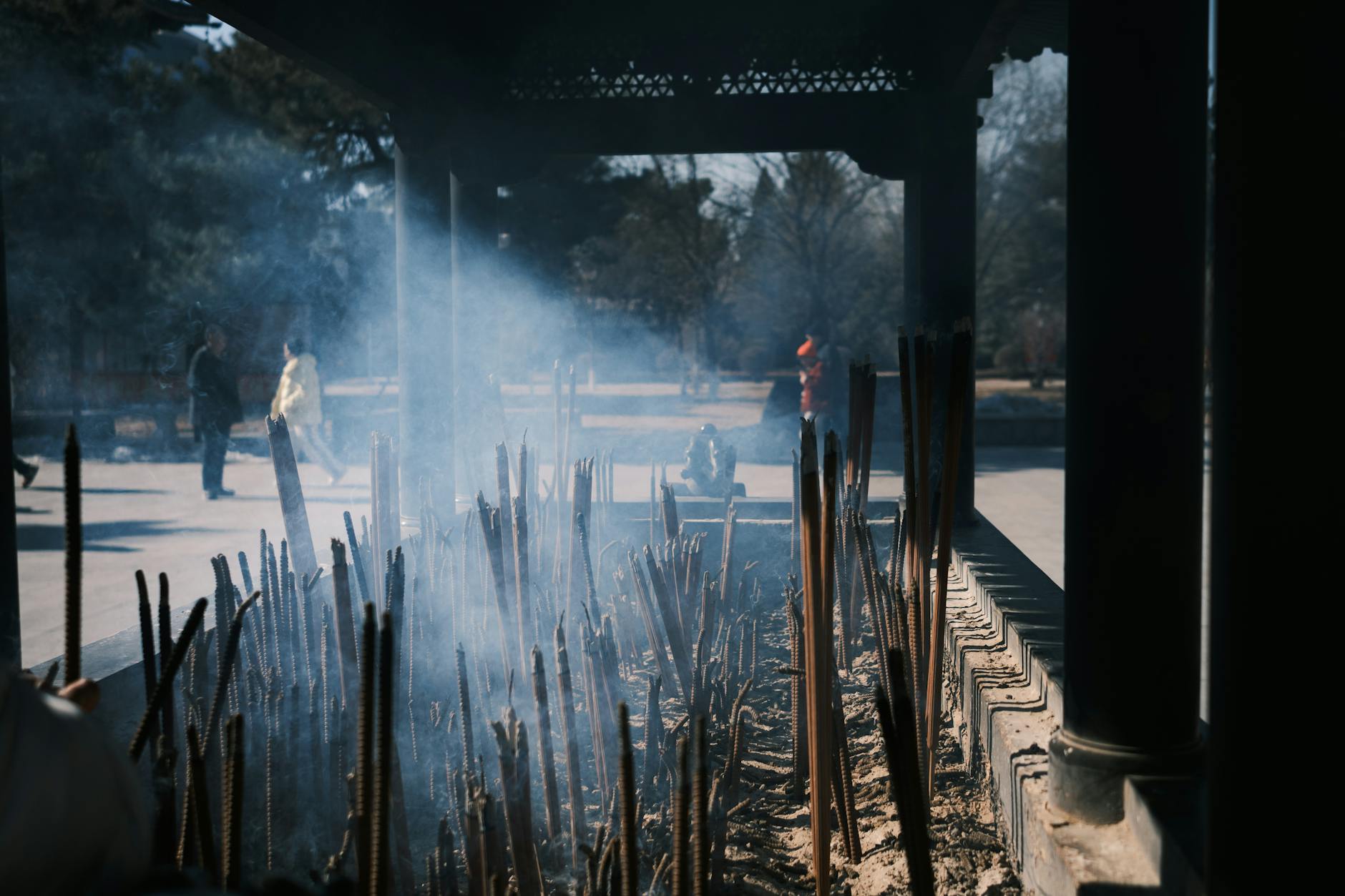 Incense burning Chinese temple worship traditional smoke