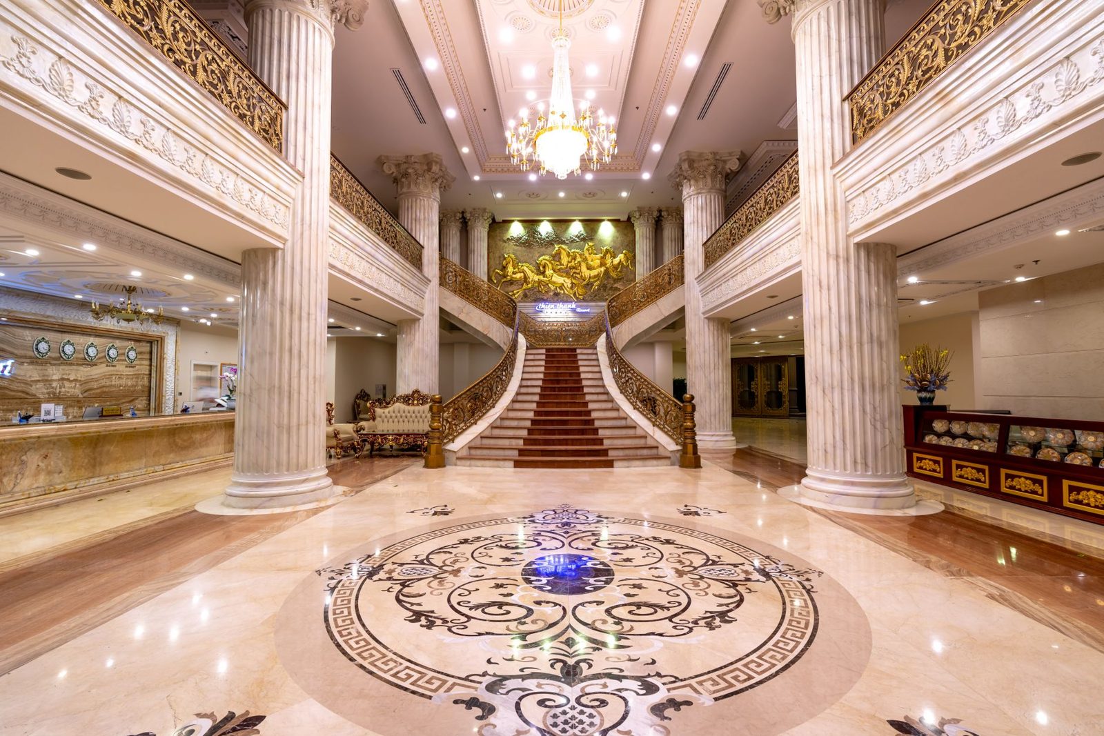 Grand five-star hotel lobby with marble and chandelier in Jakarta