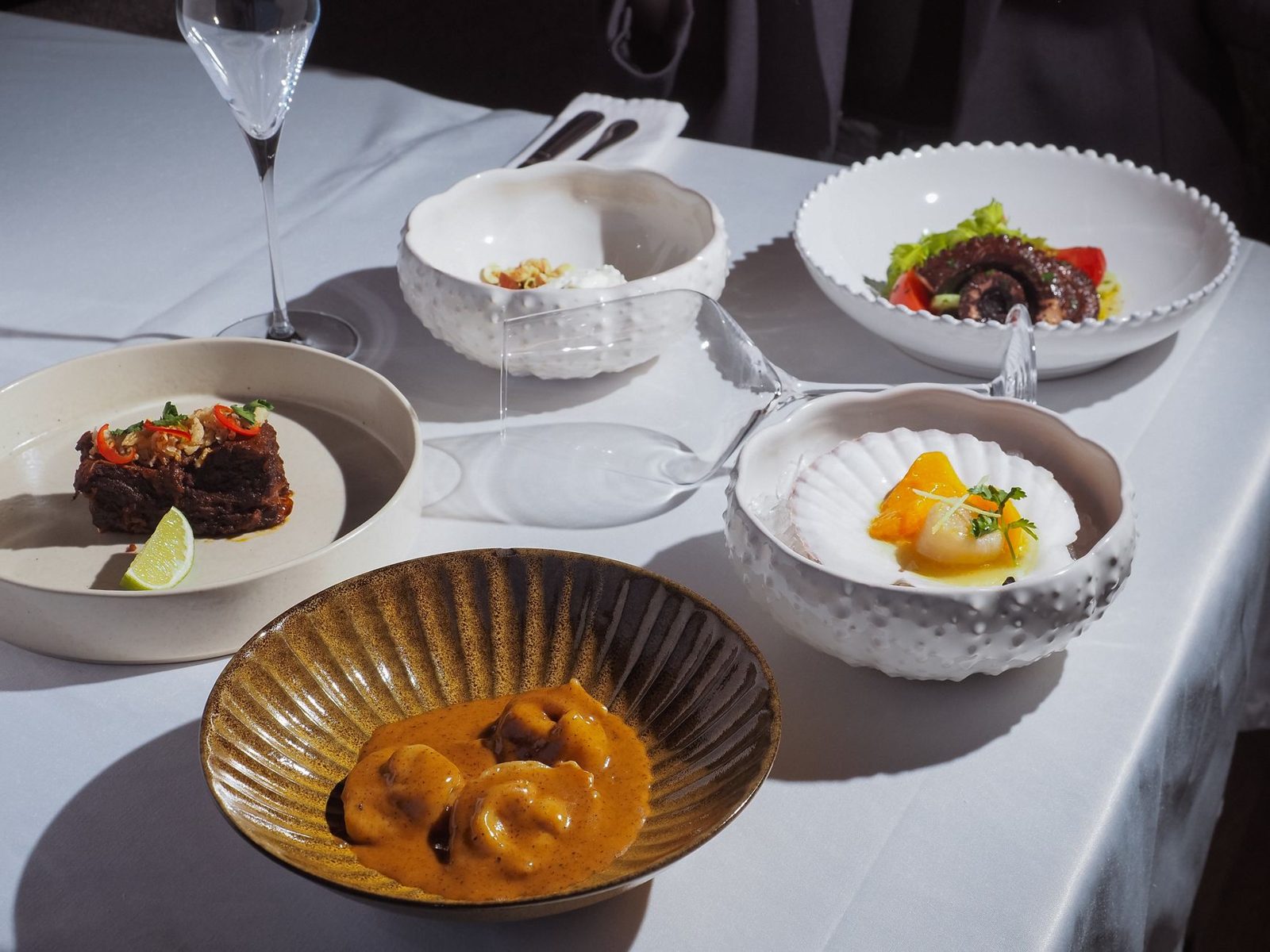 Fine dining tasting-menu plate at an upscale Jakarta restaurant