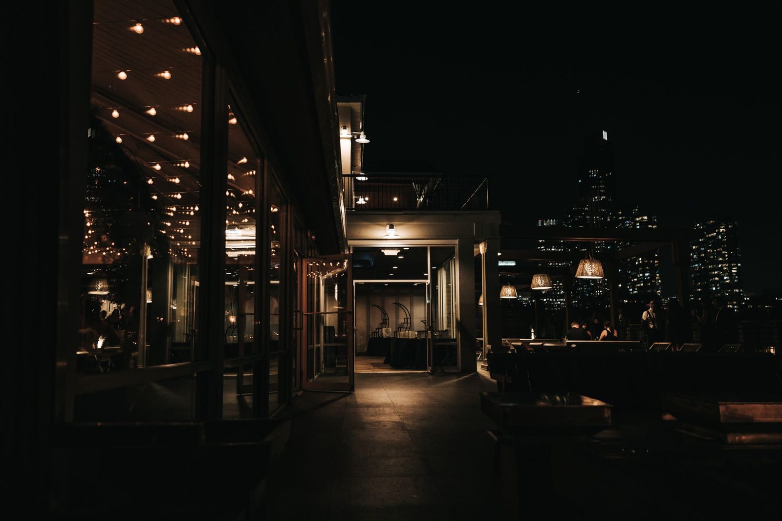 Rooftop bar overlooking the Jakarta skyline at night