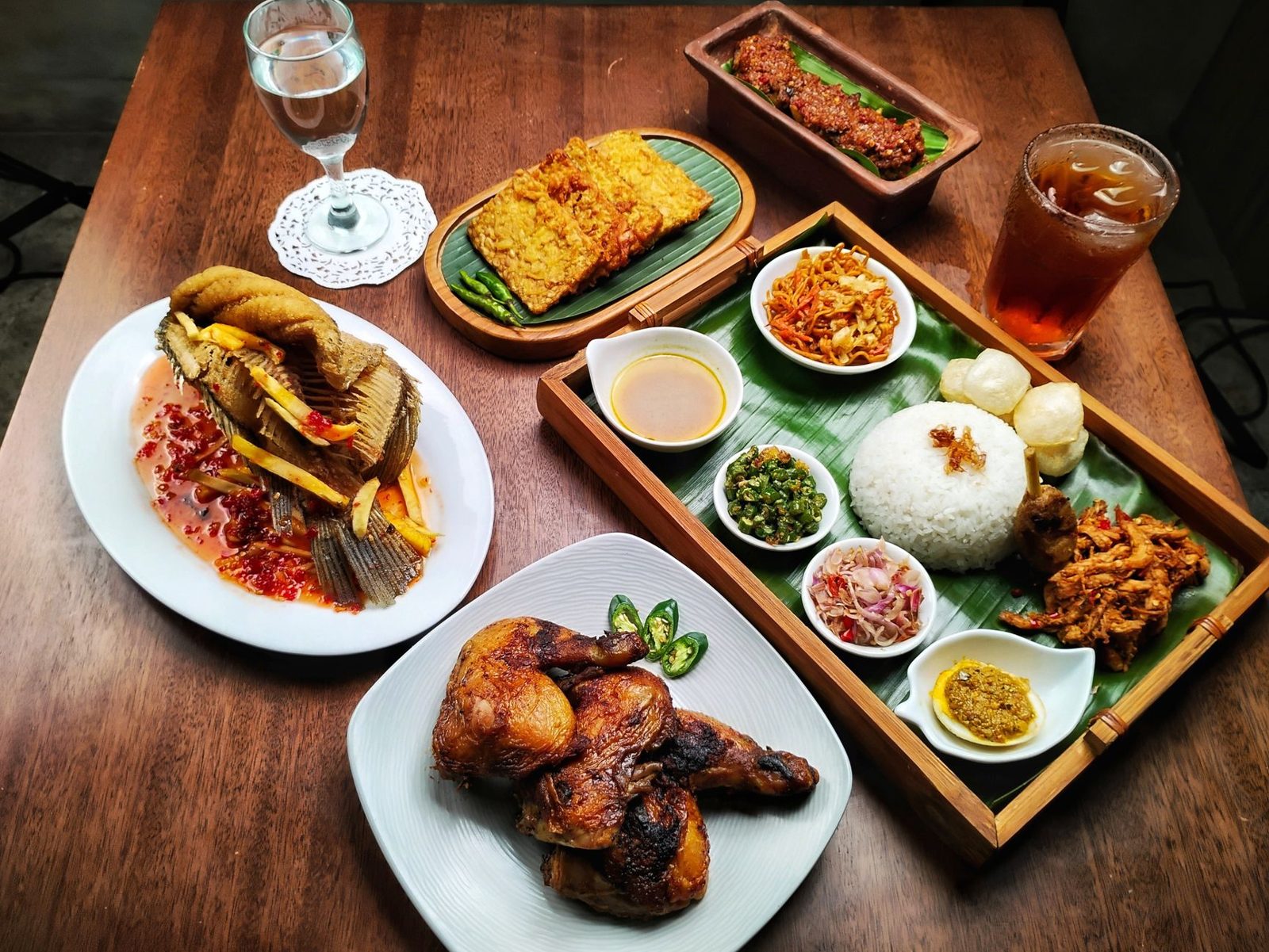 A nasi uduk breakfast plate, the best nasi uduk Jakarta serves with fried sides