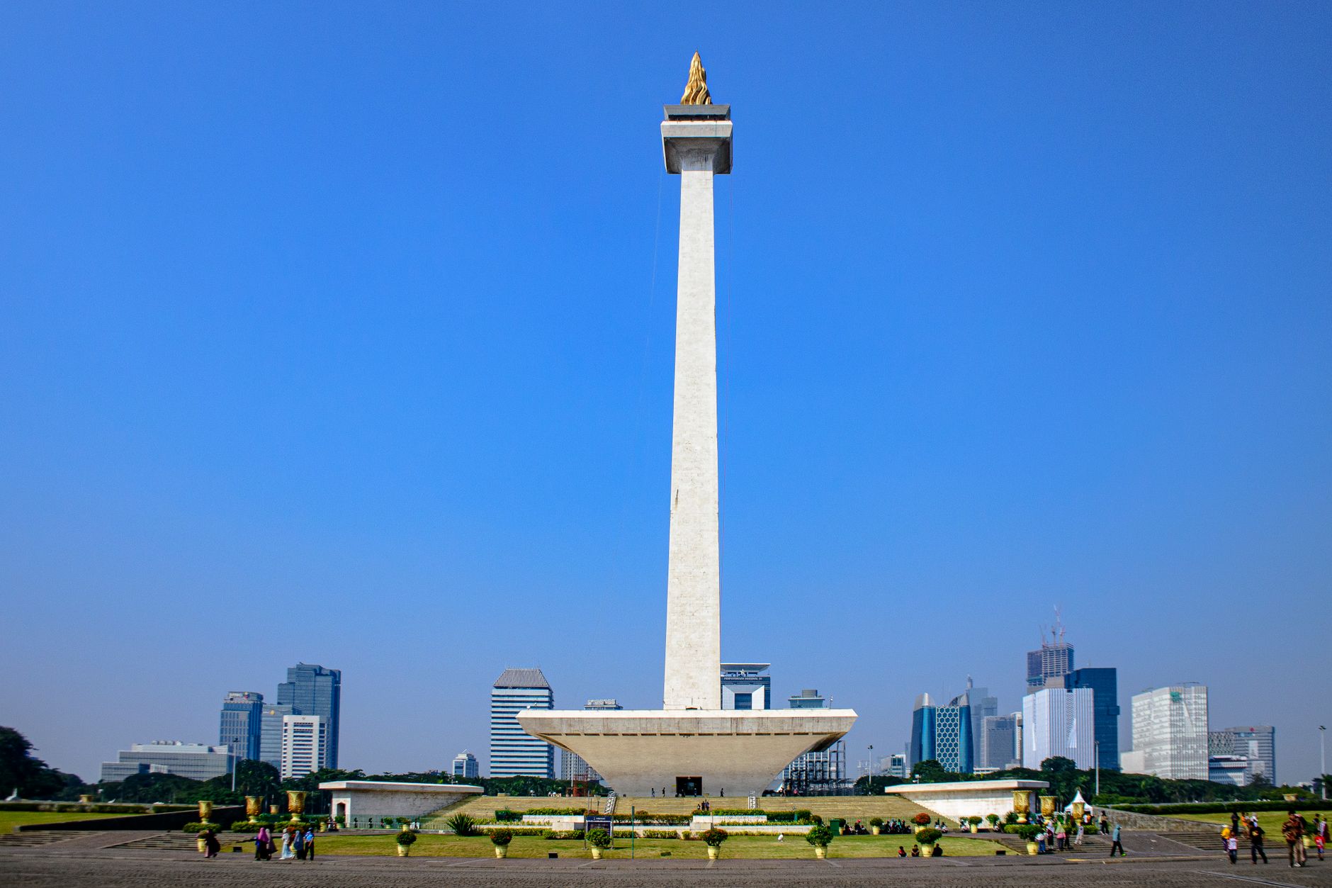 The National Monument, Monas, standing under a clear blue sky in Jakarta on a low-pollution day
